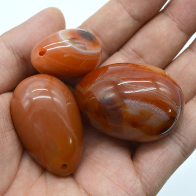 Περιφερειακό χαρακτηριστικό Yoni Egg Carnelian και Red Jade Egg για κολπική άσκηση 45 * 30mm